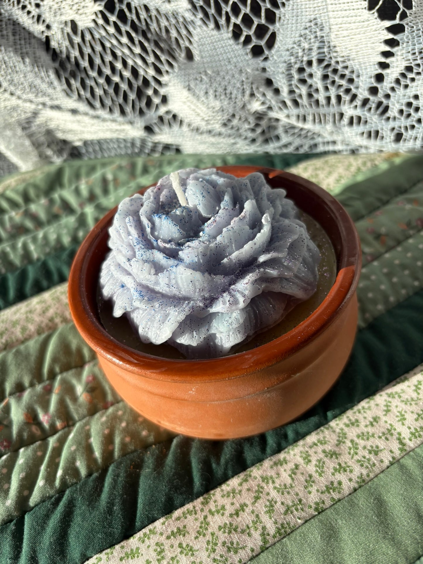 Upcycled pot plant candle