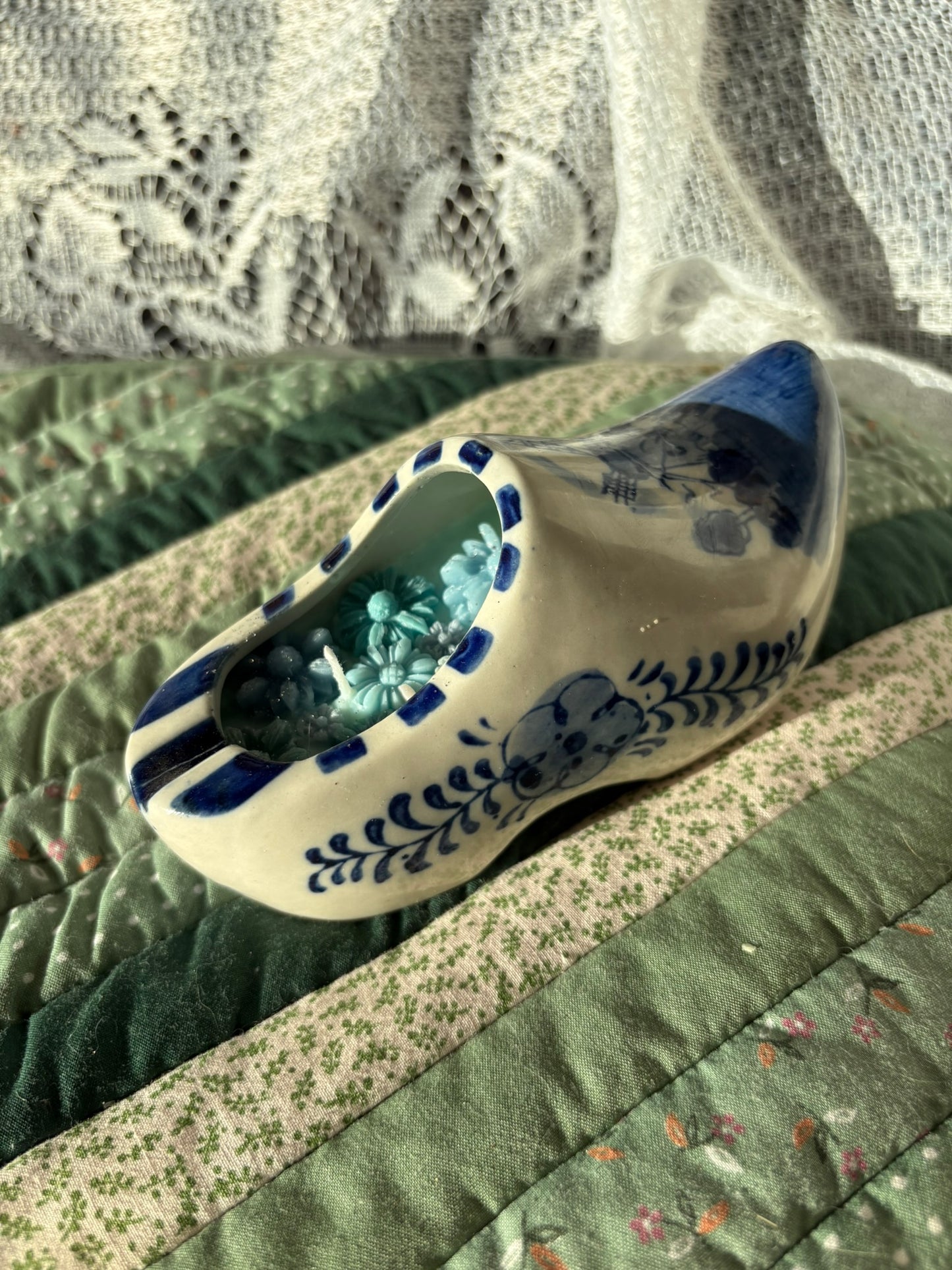 Upcycled shoe candle