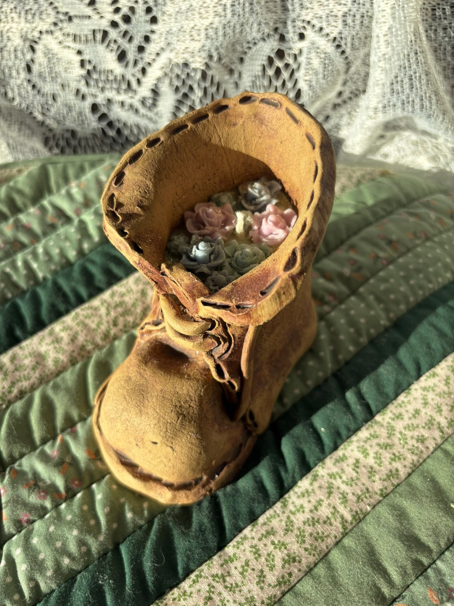 Upcycled boot candle