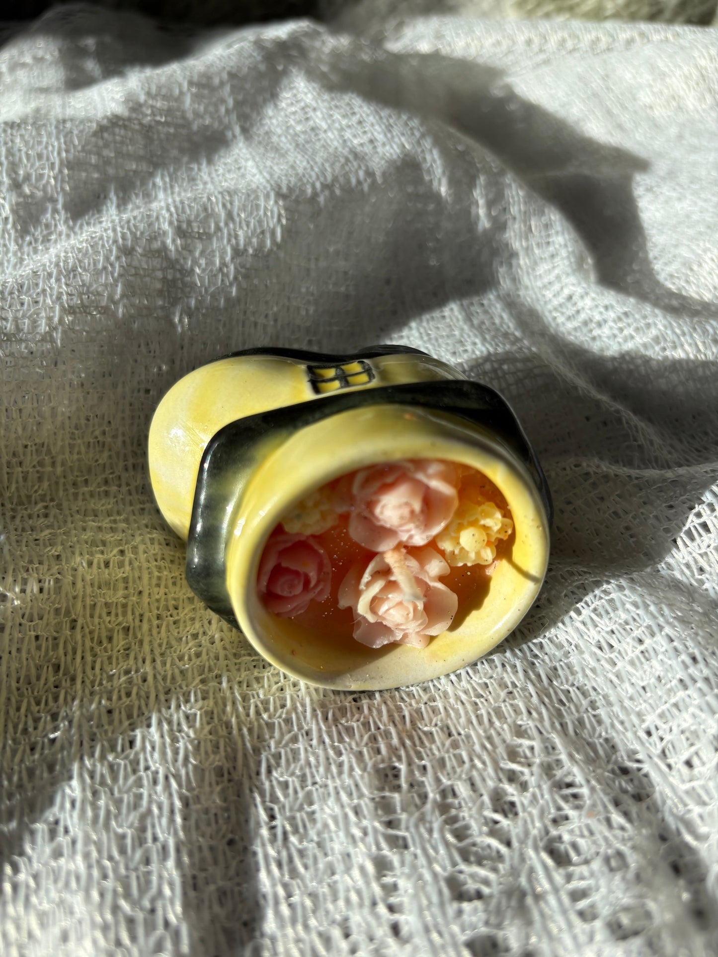 Upcycled shoe candle