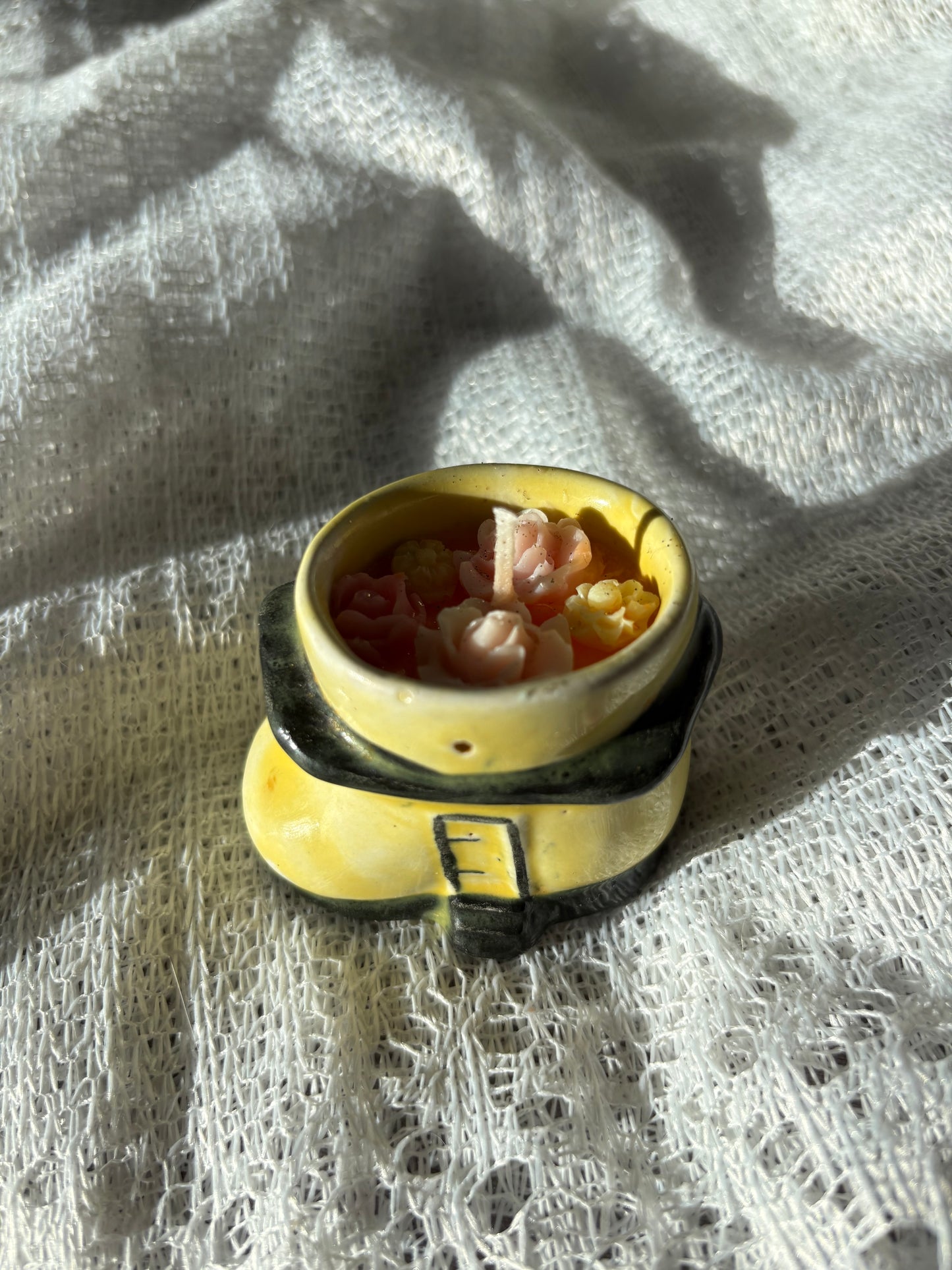 Upcycled shoe candle