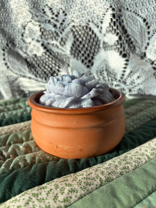 Upcycled pot plant candle