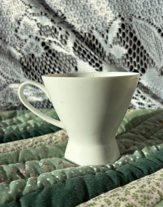 Upcycled teacup candle
