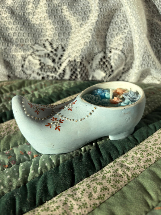Upcycled shoe candle