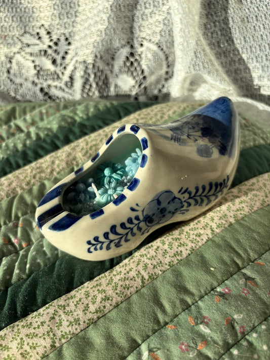 Upcycled shoe candle