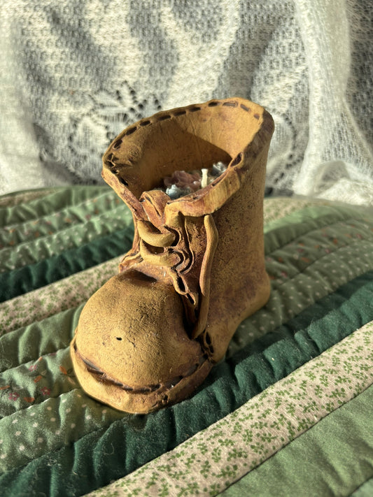Upcycled boot candle