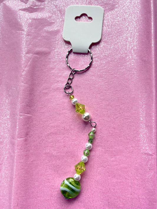 Keychain with beads on a pink background
