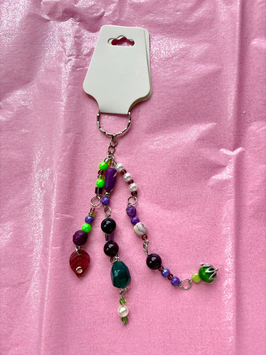 Beaded keychain on a pink background